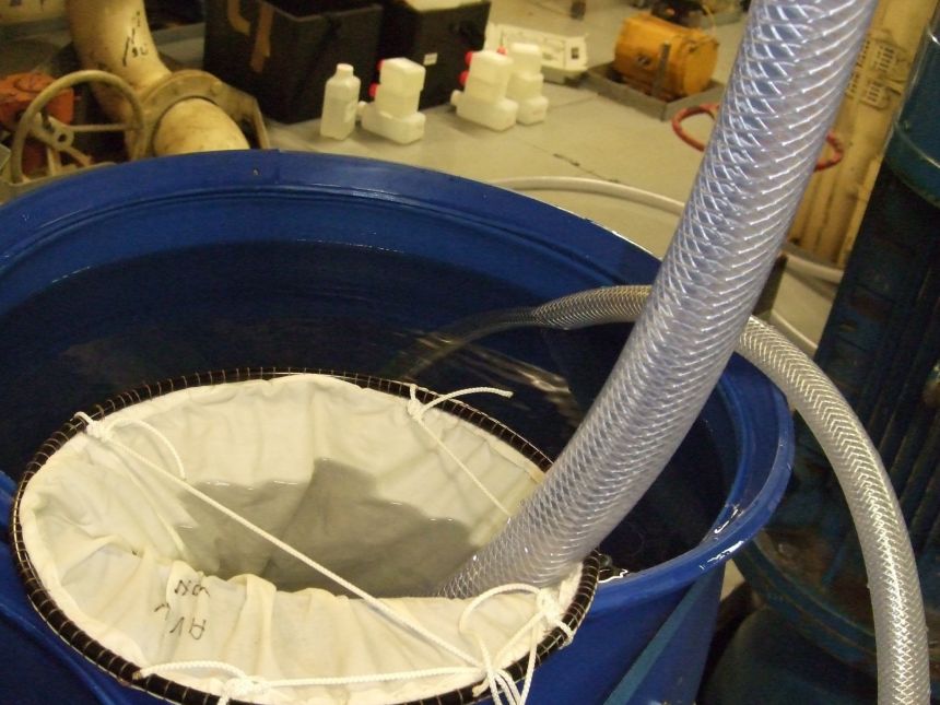 Water tank with testing equipment