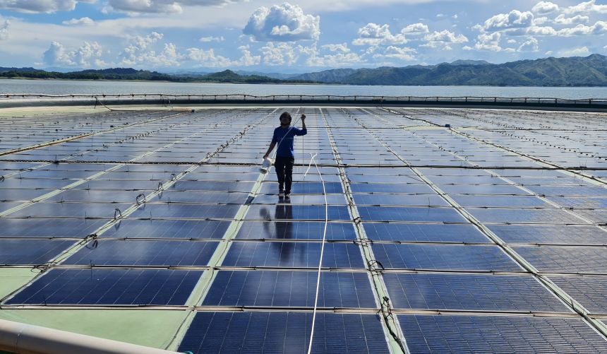 Person standing on solar panels